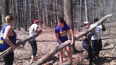 Students cleaning up local state forest trails